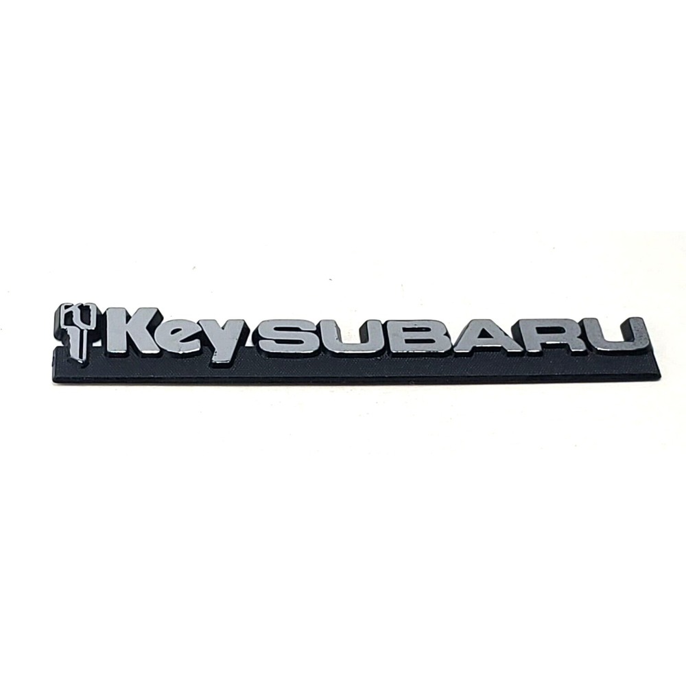 Key Subaru Dealer Emblem Plastic ‎ Auto Car Badge VTG -GL441